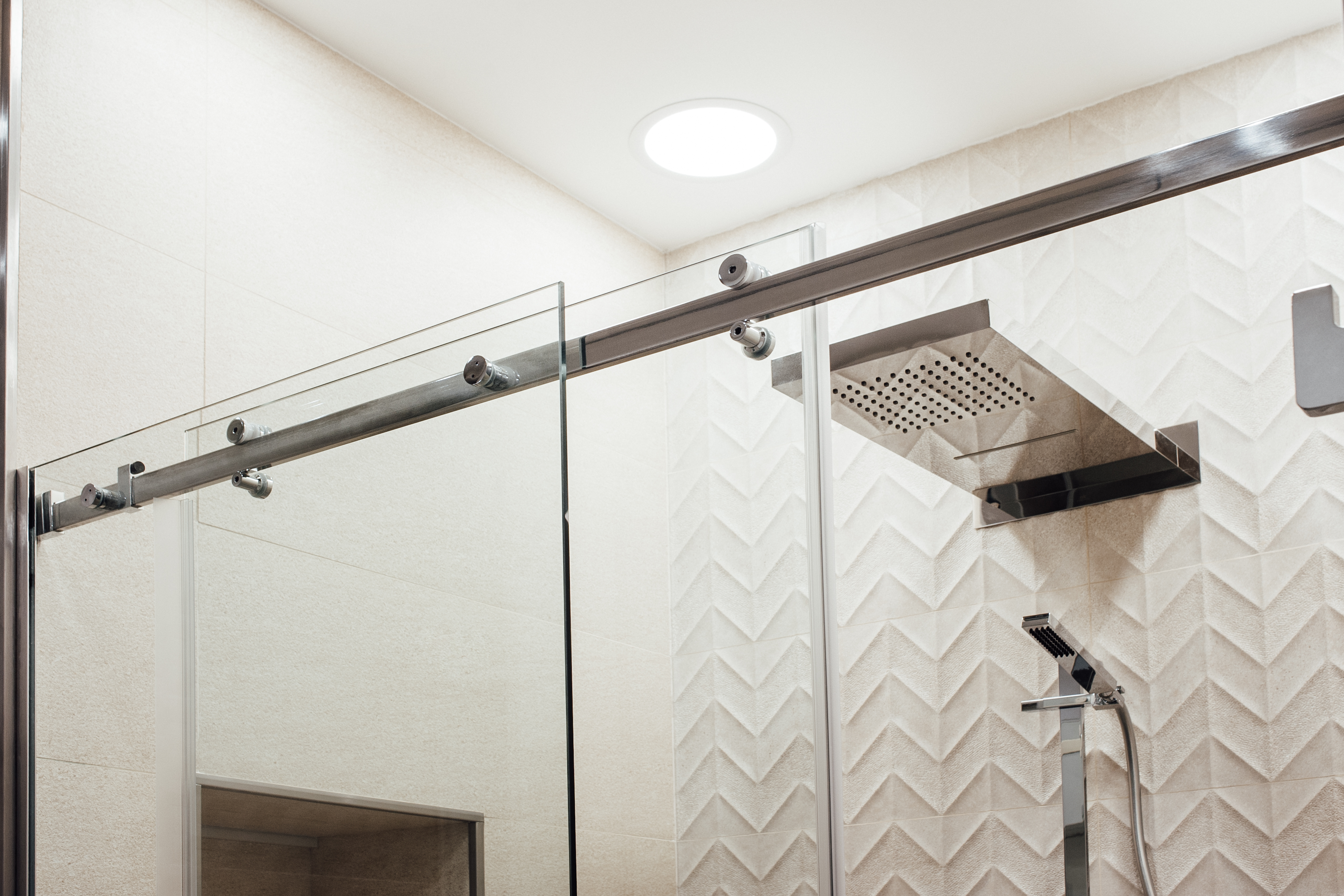 Frameless shower door installation in Dallas home
