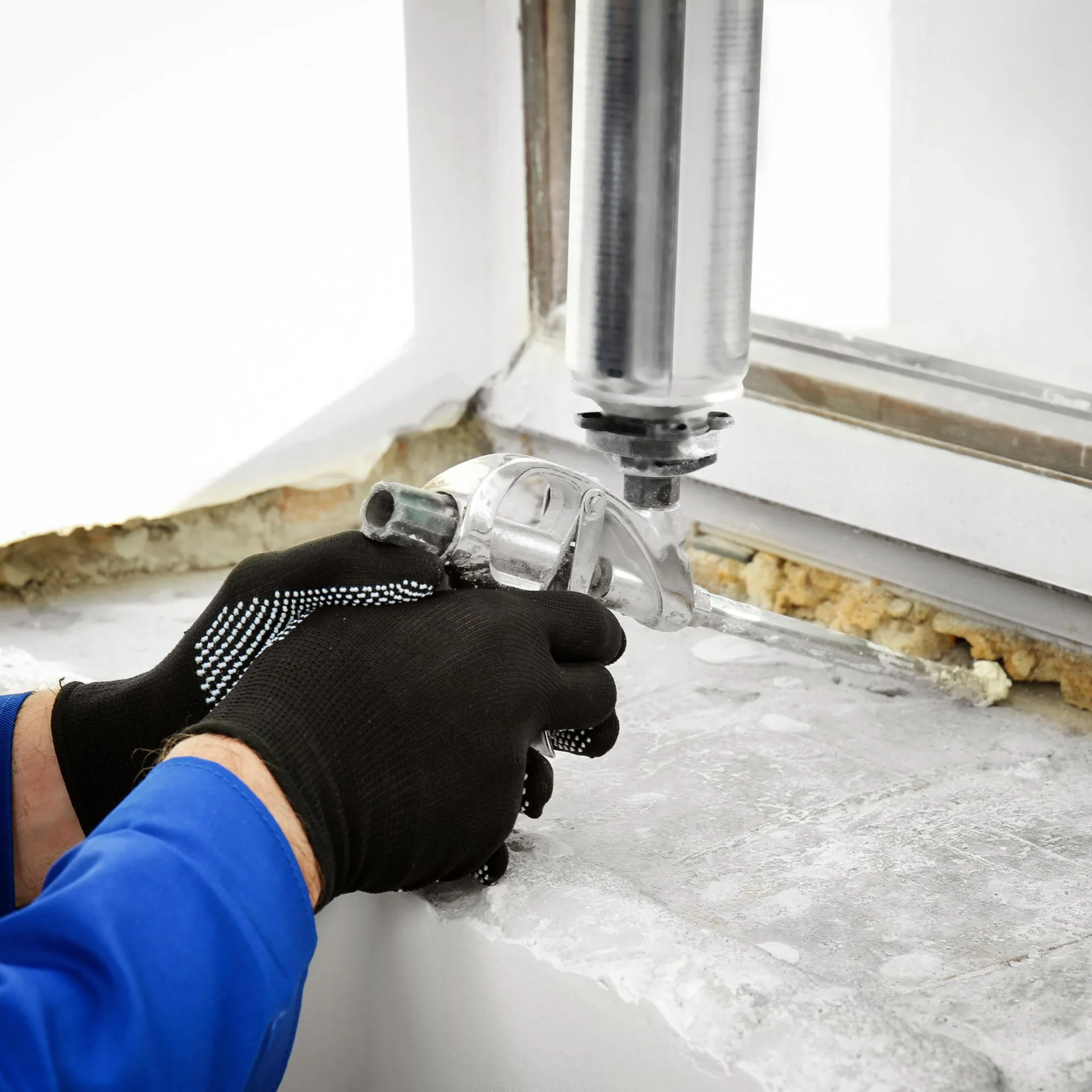 Expert glass installation team in uniform replacing large residential windows for a home in Dallas.